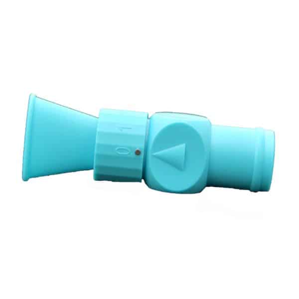 Close-up of the teal DELTA-V Lung Trainer, a sturdy plastic whistle with a cylindrical design. It has a concave mouthpiece and textured grip area, featuring an engraved arrow symbol on one side, set against a white background.
